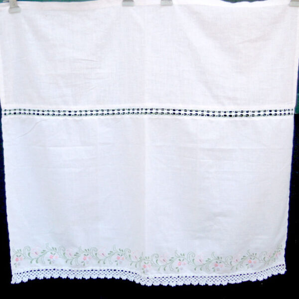 White handmade curtain with satin stitch
