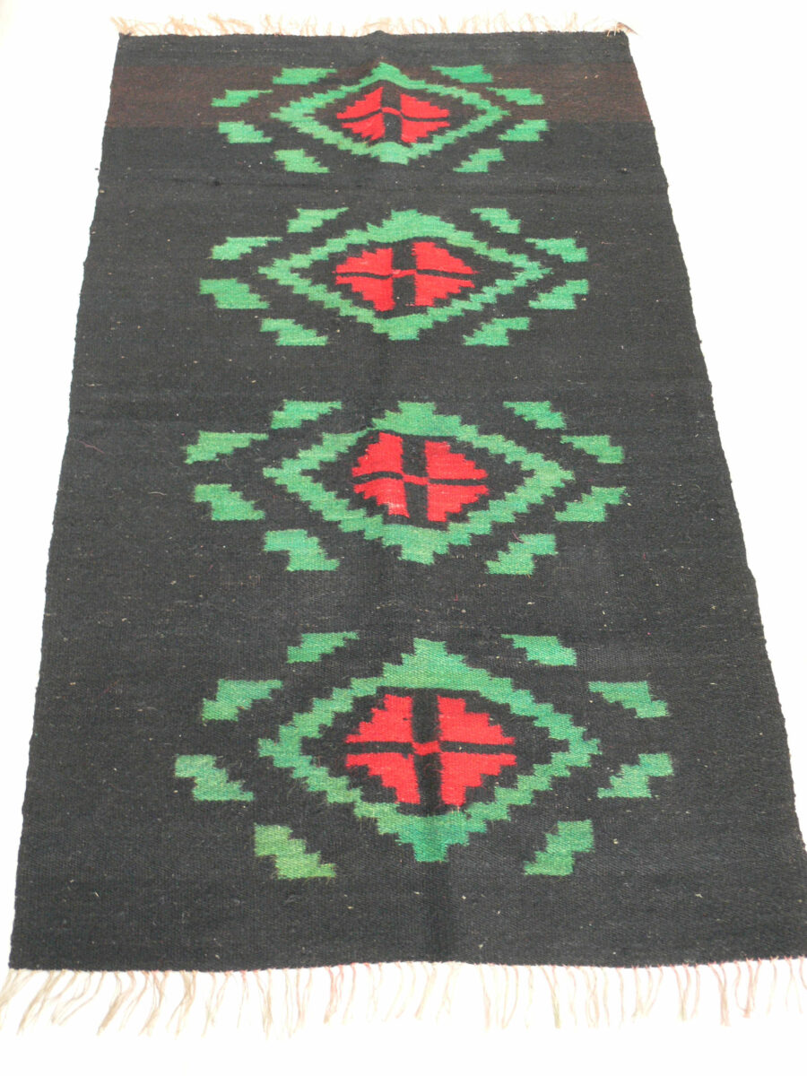 handwoven rug in black