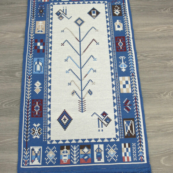 cotton woven rug in blue with tree of life