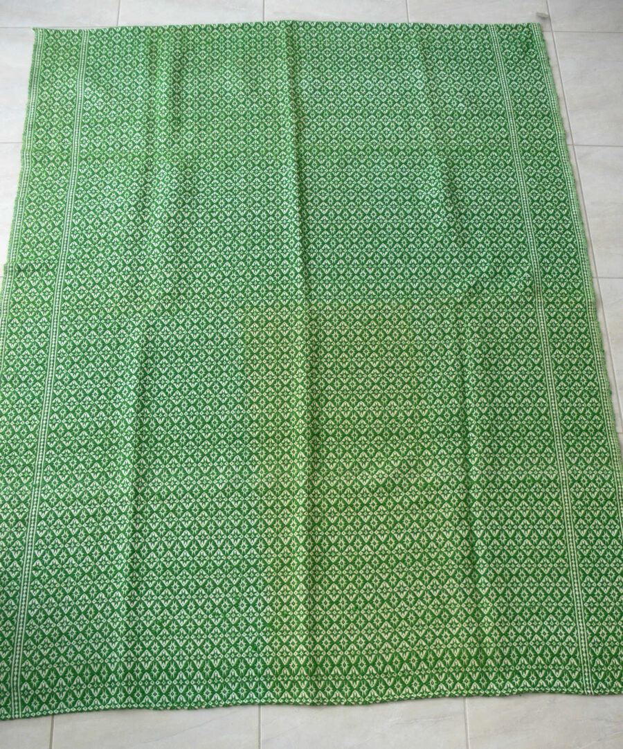 handwoven bedspread in green colour